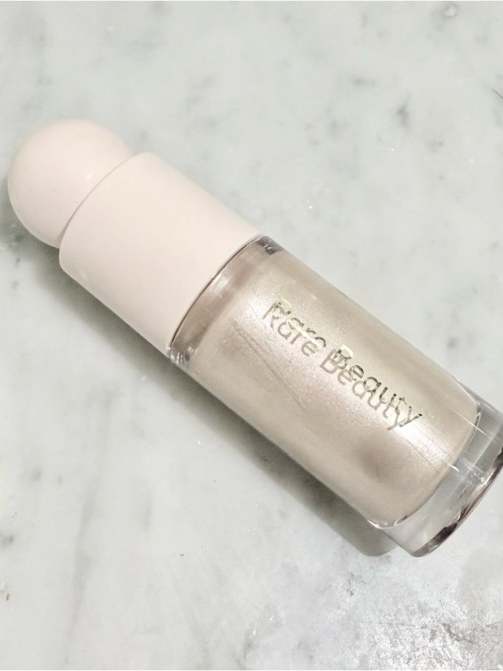 Rare Beauty Enlighten Liquid Luminizer — Pearl Champagne